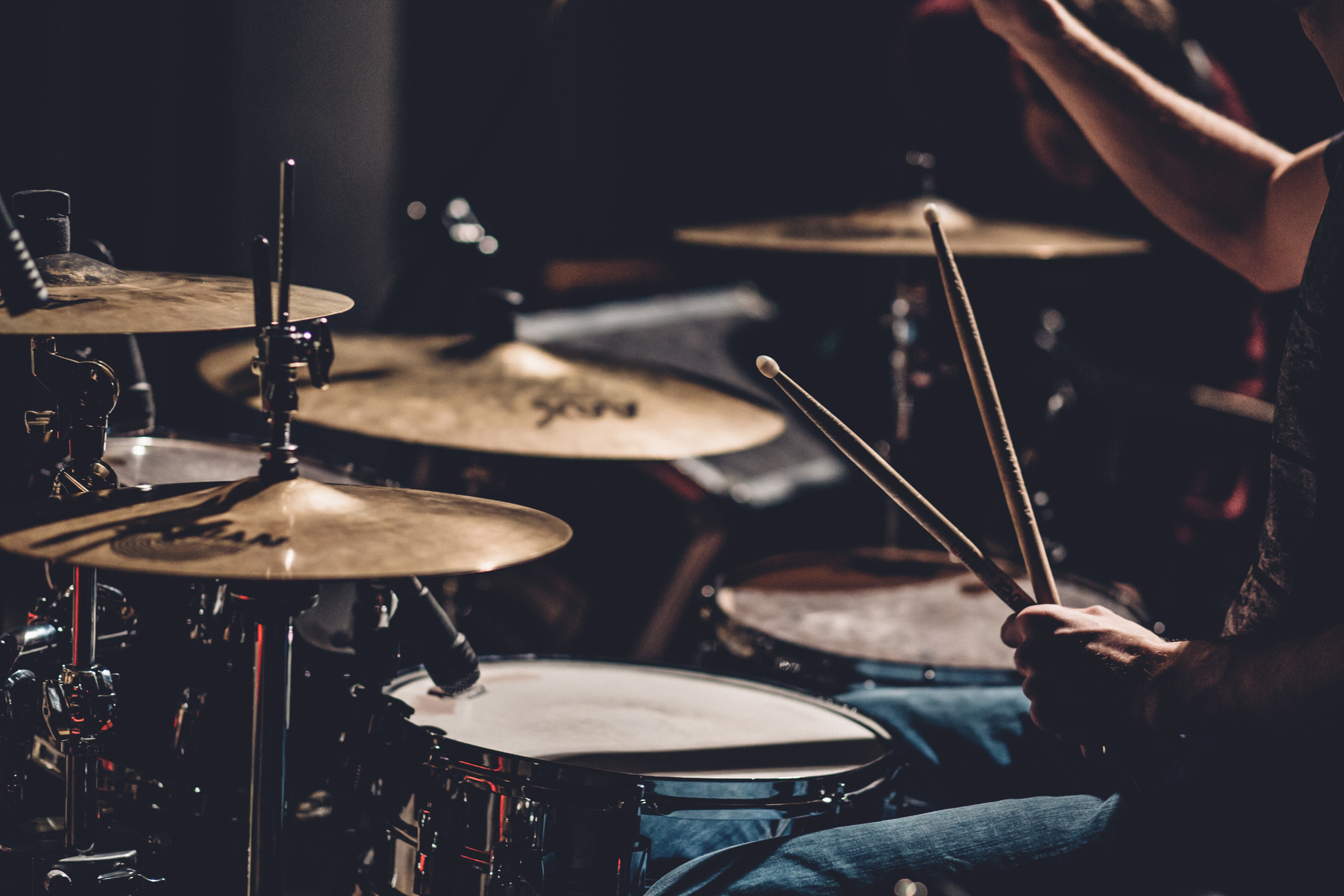 Man Playing the Drums